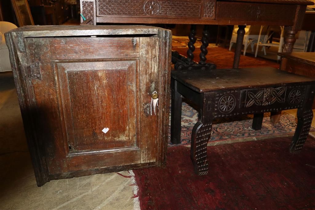 An 18th century oak wall cabinet, width 55cm, depth 28cm, height 61cm together with a commode and chip carved bow table